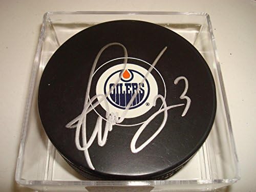 Martin Gelinas potpisao je hokejaški pak Edmonton Oilers s autogramom od MD-a